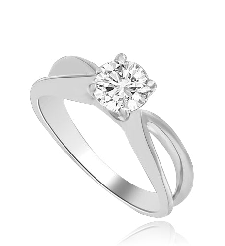 This Ring Is a sureshot hit with jewelry conossieurs. 0.75 Ct. Round Brilliant Masterpiece is set exquisitely on a cross curve band. In 14k Solid White Gold.