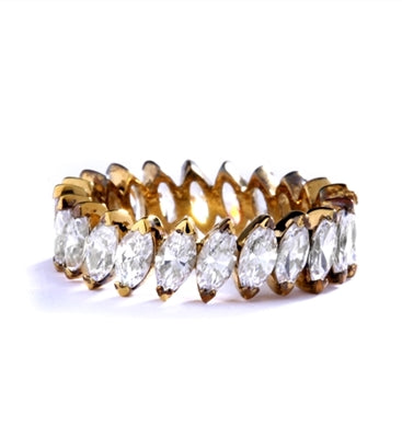 ring- marquise cut stones set in angular setting