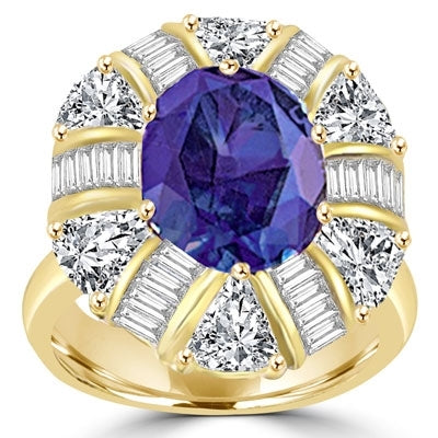 Ring  sapphire stone,baguettes and trillion cut stones around it