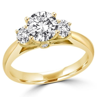 Ring  3 round stones 1 ct in center and 0.20 ct on sides