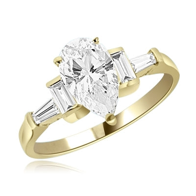 Combination of Pear, Baguettes and Emerald ring in Gold