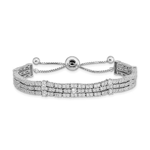 A majestic looking designer adjustable bracelet in a prong setting with three rows of artificial round brilliant Diamonds by Diamond Essence set in platinum plated sterling silver. Total 205 stones