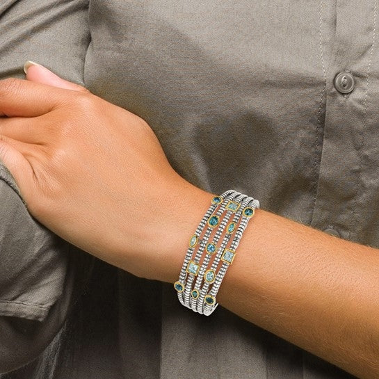 Wide cuff bracelet with diamond essence sky blue and london topaz stones in bezel setting