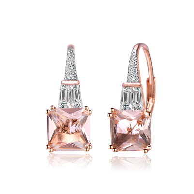 Diamond Essence Designer Earrings With 1.50 Cts. Morganite Cut Corner Princess Cut Stone And Tappered Baguettes Followed By Melee On Top, 3.50 Cts.T.W. In Rose Plated Sterling Silver.
​Approx Size Of Earrings Is 19mm Length And 7mm Width.