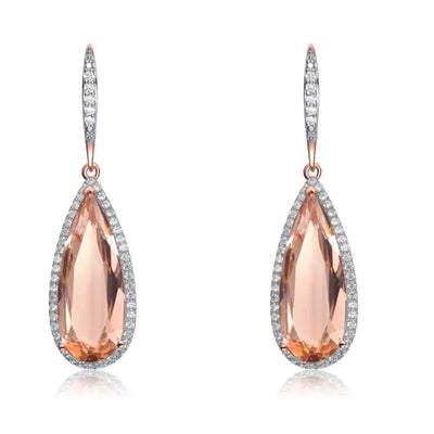 Diamond Essence Designer Leverback Earrings With Morganite Pear Essence Surrounded By Melee and Melee On the Bail, 12 Cts.T.W. In Rose Plated Sterling Silver.
​Approx Size 45mm Length And 13mm Width.