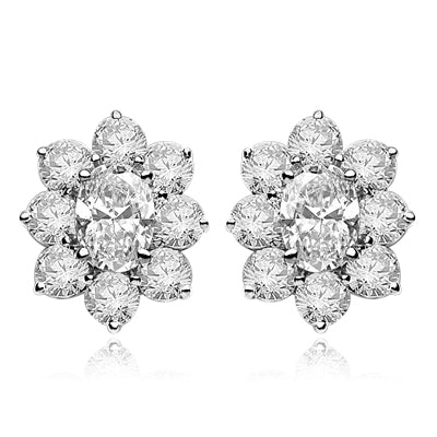 Flower Cluster - Each Earring with 1.0 Cts. Oval Center surrounded by Round Diamond Essence, 4.0 Cts. T.W. set in Platinum Plated Sterling Silver.