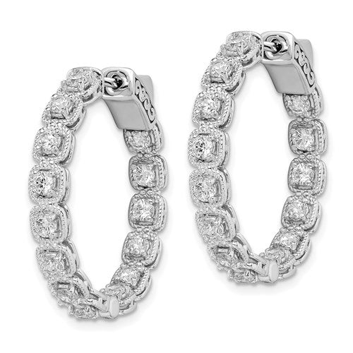Diamond Essence Platinum Plated Sterling Silver In and Out Hoop earrings 2.0 Cts.t.w. of Round brilliant Melee set in tension setting, with lock closure.
Length 28.5 mm and width 28.5 mm