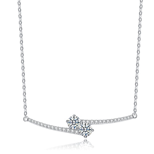 Diamond Essence U & ME Necklace, with two Round Brilliant stone set in four prongs in close connection, supported by melee on the sides. 2.25 Cts.T.W. in Platinum Plated Sterling Silver. Perfect  for any occasion.