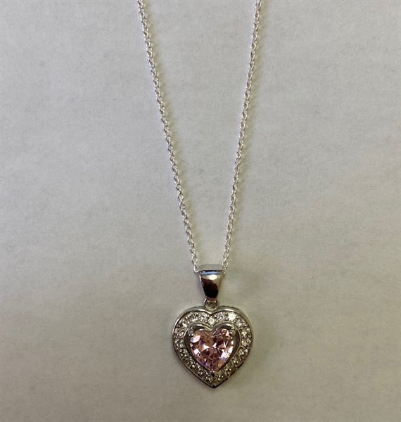 Heart shape Pink Essence stone in prong setting, is surrounded by round brilliant Diamond Essence stones, making another heart. 2.5 cts.t.w. in Platinum Plated Sterling Silver.