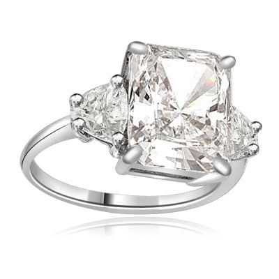 Diamond Essence emerald-cut brilliant stone of 5.0 cts. setting with trilliant baguette on each side. 6 cts.T.W. set in Platinum Plated Sterling Silver.