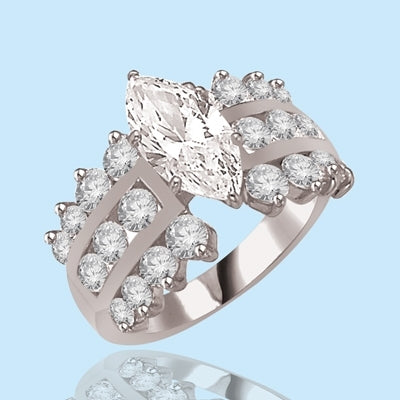 Ring-2ct marquiese cut & round channel set stones