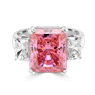 Pink Essence RingEmerald-cut 8-carat Pink Essence ring with Diamond Essence baguettes. 8.5 cts. T.W. set in Platinum Plated Sterling Silver.