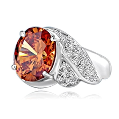 Platinum Plated Sterling Silver ring, with a large oval 6.0 cts. Diamond Essence champagne stone at the center flanked by melees on a twisted shank, 7.50 cts. T.W.