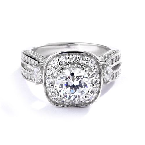 1.50 cts. Round Brilliant Diamond Essence in the center Surrounded by Melee, accompanied by Princess cut Diamond Essence and rows of Sparkling Melee on each side of the band, 3.0 cts. t.w.