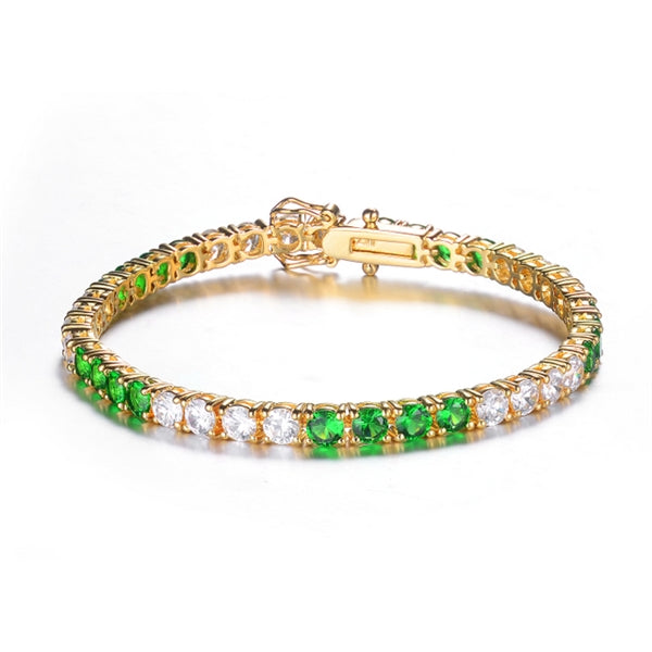 7 inches long tennis bracelet with Round cut Diamond Essence and Emerald  Essence stones, 0.20 carat each set in alternate group of 4 stones. 10.4 cts.t.w. in Platinum Plated Sterling Silver.