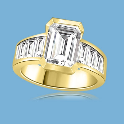 Escape with this Wide Band Ring with Channel Set Emerald Essence, 2.5 cts., separated by straight Diamond Bright Baguettes set vertically for a totally magnificent effect. 3.5 cts. T.W. set in 14K Gold Vermeil.
