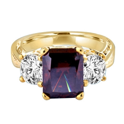 Finely crafted Chocolate Essence Emerald Cut Stone is flanked by saluting 1 Ct Round Brilliance. The band is ethnic and sexy! 6 Cts. T.W. set in 14K Gold Vermeil
