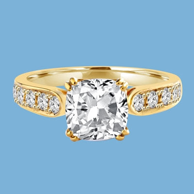 Diamond Essence Ring with 2.0ct. Cushion Cut stone set in eight prongs with round stones on each side, 3.5ct. T.W. set in 14K Gold Vermeil.