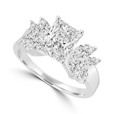 Apassionata - Unusualluy stylish Ring with 1.5 Cts. Radiant Emerald Diamond Essence center and Marquise accents, 3 Cts. T.W, in 14K White Gold.