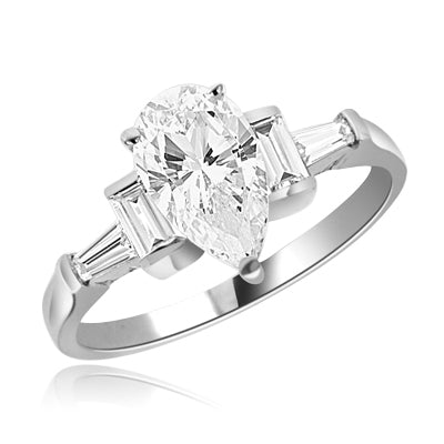 Combination of Pear, Baguettes and Emerald ring in White Gold