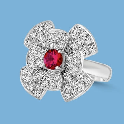 Stack of flowers - 0.65 Ct. Round Ruby Essence set in center of floral design Melee setting. 3.0Cts. T.W. set in 14K Solid White Gold.