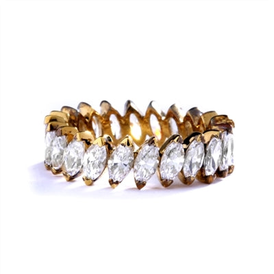 ring- marquise cut stones set in angular setting